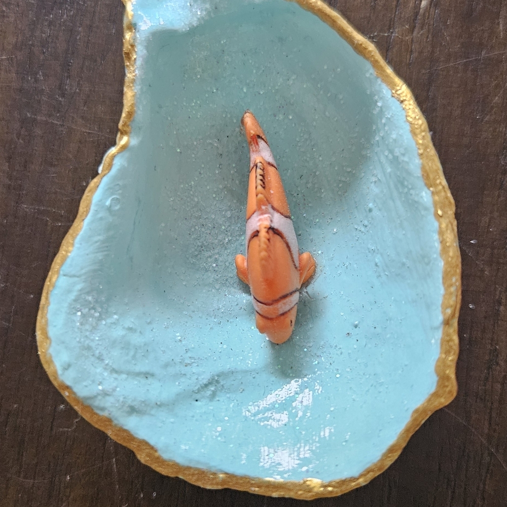 Orange and White Fish Decor in Blue and Gold Dish
